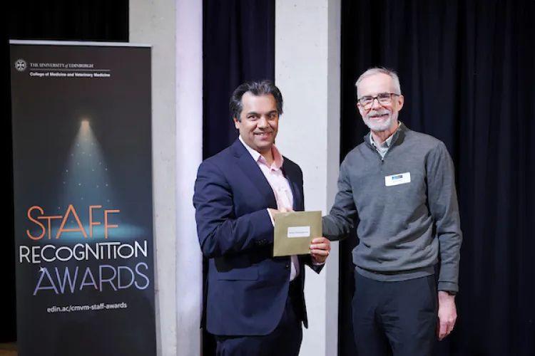 (Left of picture) Professor Suvankar Pal receiving CMVM Staff Recognition Award for Student Experience together with Martin Denvir (right of picture)
