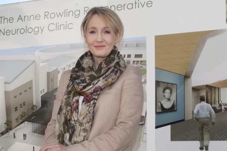 J.K Rowling pictured in-front of the Anne Rowling Clinic banner