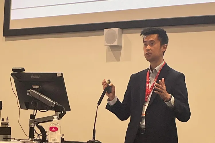 Isaac Chau presenting at the Royal College of Nursing's International Nursing Conference 2026